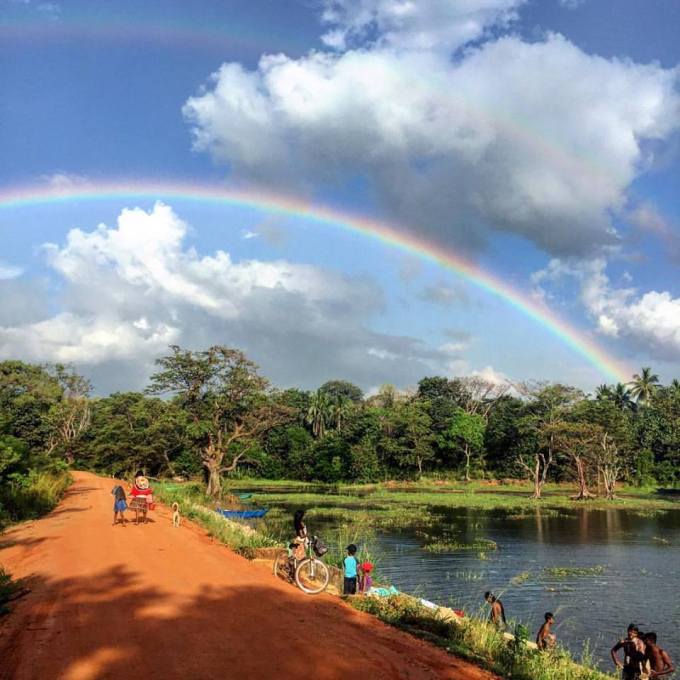 Double rainbow over Hiridunna Village and Lake