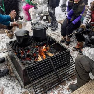 S'mores around the bonfire after yoga on a frozen lake