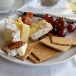 Somerset Brie, Blue Stilton and Black Bomber Cheese served with Quince Paste, Grapes, Nuts and Crackers