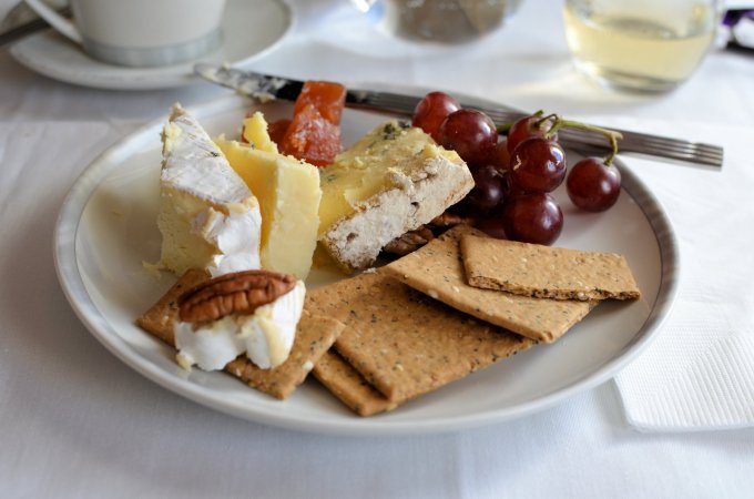 Somerset Brie, Blue Stilton and Black Bomber Cheese served with Quince Paste, Grapes, Nuts and Crackers